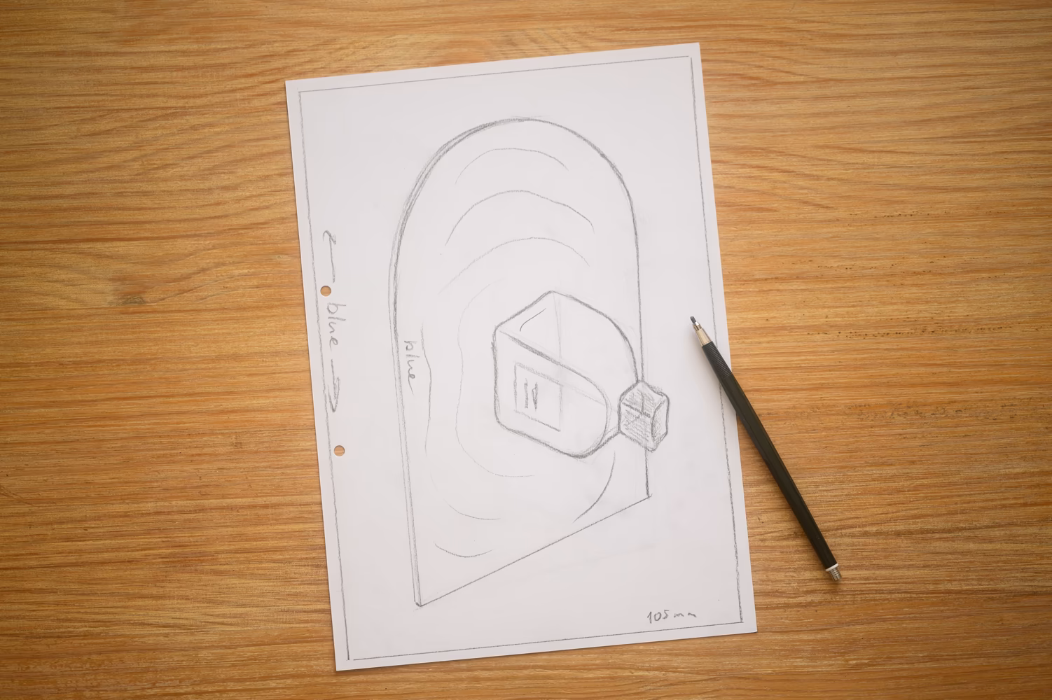 A pencil sketch on paper by mmiri studio illustrating the concept for an Acqua di Gioia perfume bottle shot. The drawing explores the composition, featuring the bottle on an arched, water-like mirror surface, capturing the planned visual elements of the final photograph.